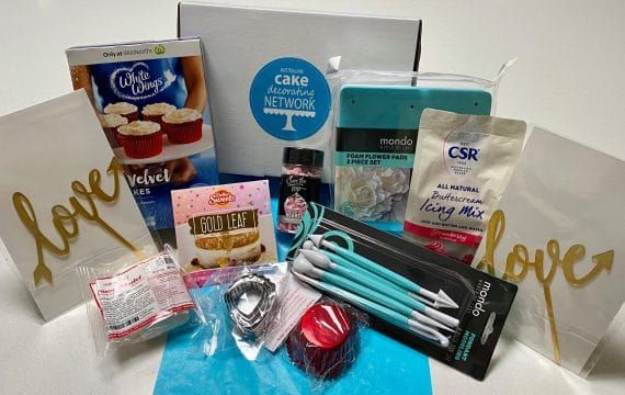 A past Baking Box, the Party edition, opened to show its tools and products