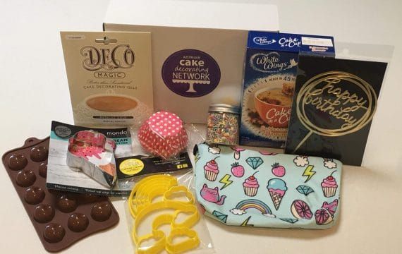 A past Baking Box, the Birthday edition, opened to show its tools and products