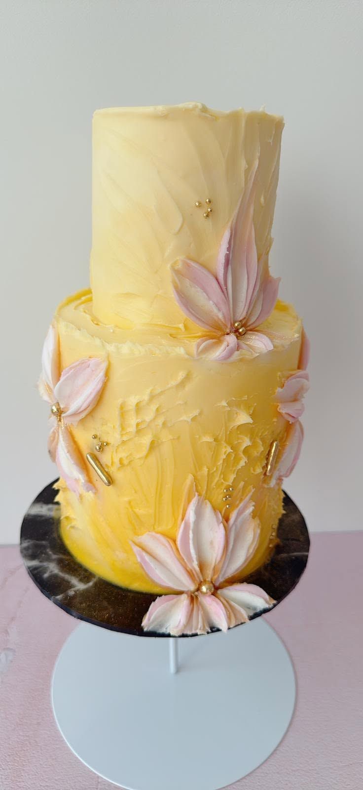 A textured buttercream cake with palette-knife florals by Monica Cavallaro