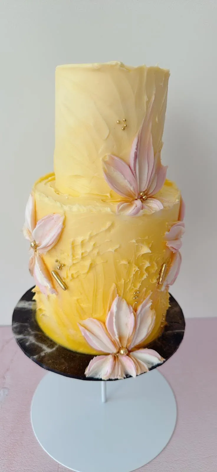 A textured buttercream cake with palette-knife florals by Monica Cavallaro